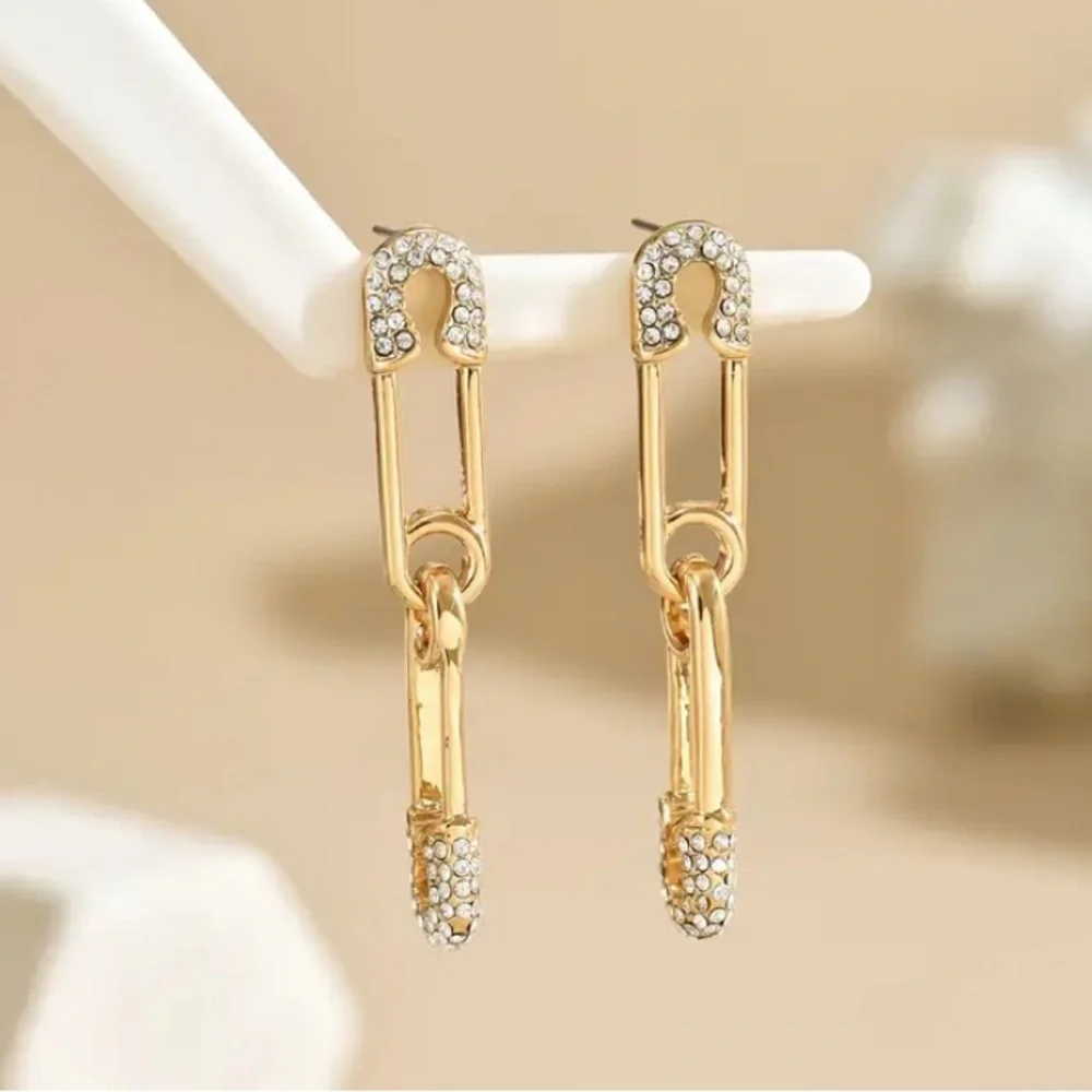 Elegant Gold and Silver Hoop Earrings with Intricate Detailing - Picture 2 of 5